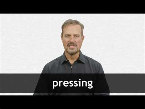 PRESSING definition in American English .